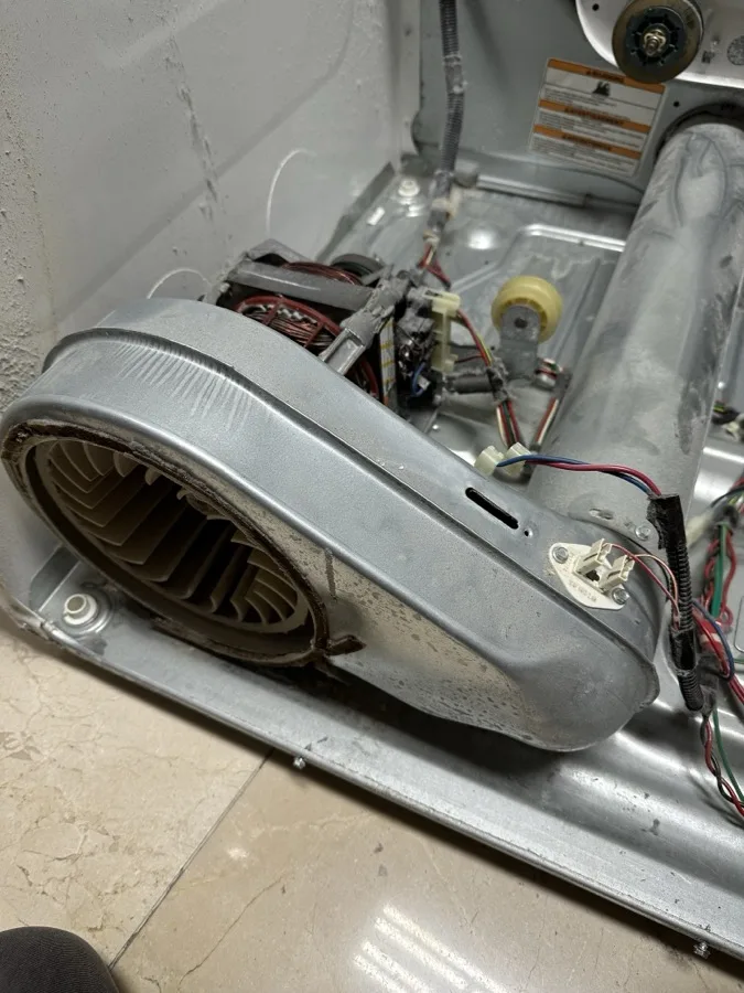 Dryer thermal fuse replacement with blower housing removed during repair