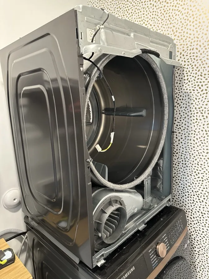 Samsung dryer belt replacement with front panel removed during repair